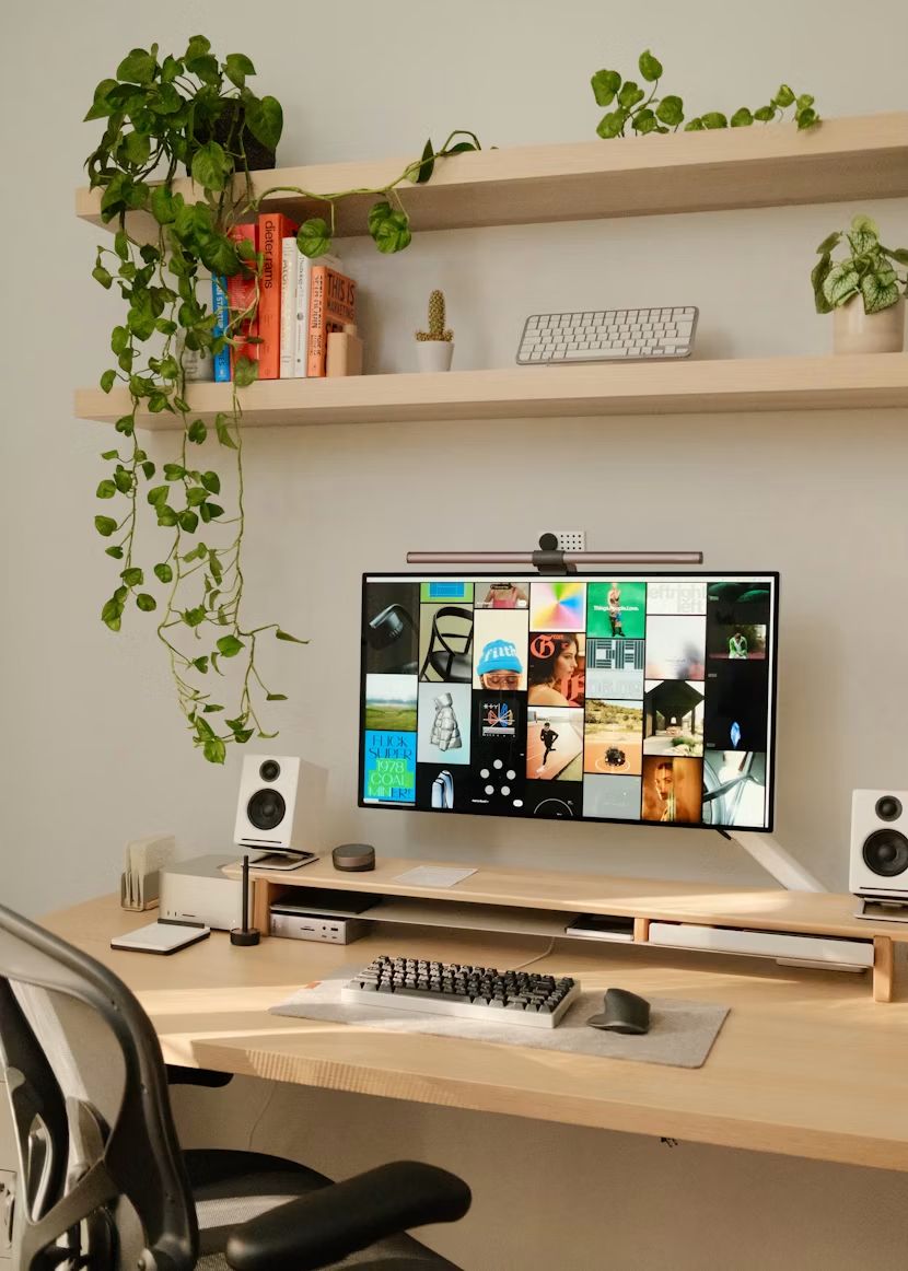 The studio desk with a monitor of brand references